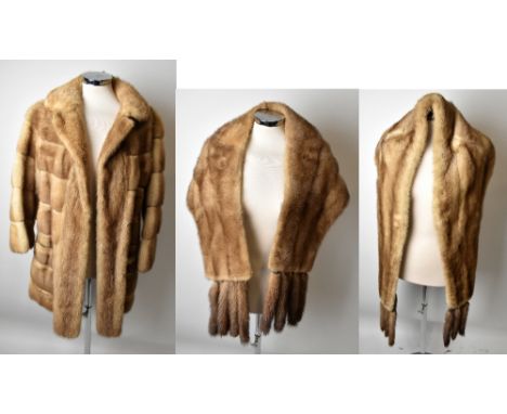 A short light brown leather mink coat, c1950s, with collar and striped pattern detail, with cuffed sleeves, large collar and 