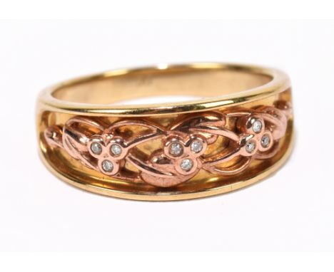 CLOGAU; a 9ct gold ring set with nine small diamond, ring size Q, aprox weight 4.8g.&nbsp;