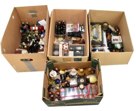 A large collection of alcohol miniatures contained to include Bell's whisky, Ballantine's Scotch whisky, Jäegermeister etc.&n