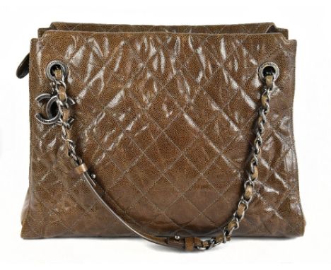 CHANEL; a vintage City Shopping tote shoulder bag, made from brown quilted caviar leather with gun metal tone hardware, year 