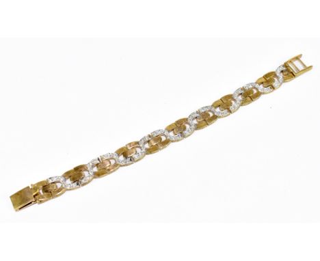 A 9ct yellow gold diamond set bracelet formed of D-shaped links set with a continuous row of diamonds, length 18.5cm, approx 