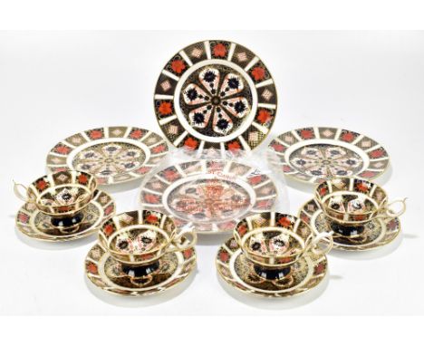 ROYAL CROWN DERBY; a four setting part tea service decorated in the 1128 pattern (12).Additional InformationThe majority of t