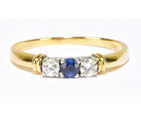 An 18ct yellow gold diamond and sapphire three stone ring, size Q, approx 2.3g.Additional InformationThe diamonds and sapphir