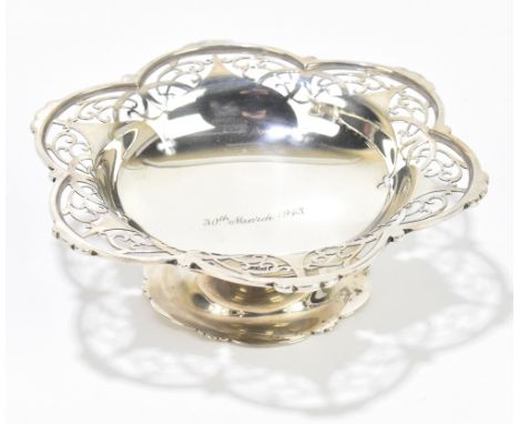 E J M J; a George VI hallmarked silver pedestal bonbon dish with pierced scrolling edge engraved '30th March 1943', Sheffield