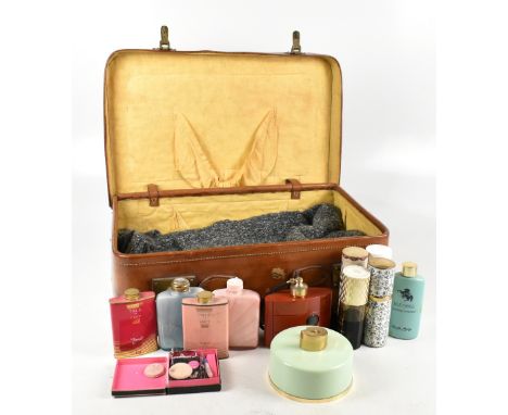 A collection of vintage lady vanity perfumes and powders including Nina Ricci, Yves Saint Laurent Opium dispenser, and a Cute