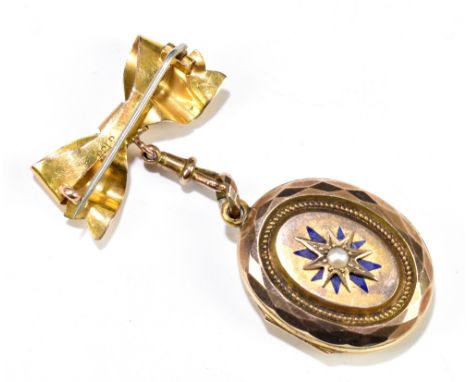 A Victorian yellow metal and blue enamel seed pearl set oval locket on a 9ct yellow gold bow pin brooch attachment.&nbsp;