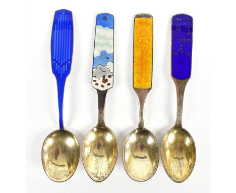 GEORG JENSEN; four silver and enamel decorated spoons, detailed for 1961, 1963, 1964 and 1967, average length 16.5cm, approx.