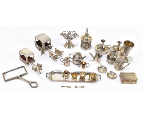 SAUNDERS &amp; SHEPHERD; a pair of hallmarked miniature silver chamber sticks, Chester 1892, a silver miniature ten piece tea
