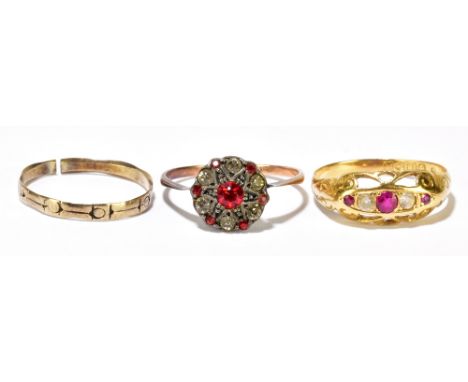 An 18ct yellow gold diamond and ruby five stone ring, size N, approximately 2g, a 9ct rose gold silver dress ring,&nbsp;appro