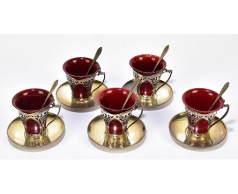 ROYAL DOULTON FLAMBE; five teacups with hallmarked silver mounts for Goldsmiths &amp; Silversmiths Co, London 1906, with five
