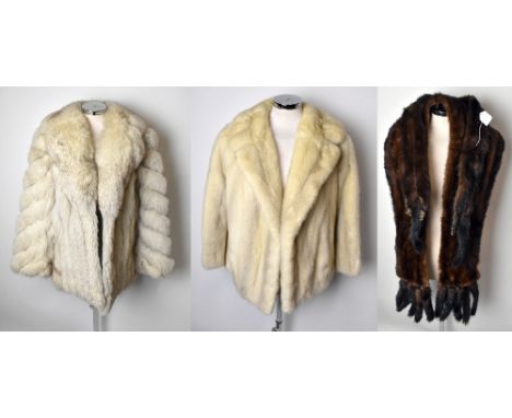 A late 20th century SAGA fox fur short jacket, fully lined and measuring 36" chest, a vintage cream short fur jacket and two 