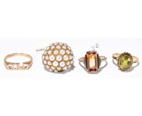 Four 9ct yellow gold dress rings, one set with pale green peridot, one spelling the word 'Gold', sizes 2x K, M and N 1/2, com