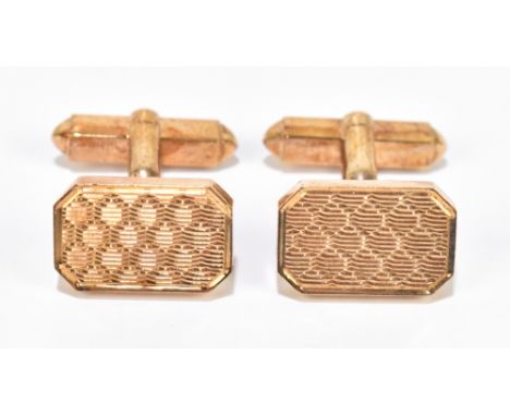 A pair of 9ct yellow gold cufflinks with engine turned decoration to the rectangular platforms,&nbsp;approximately 16.1g.&nbs