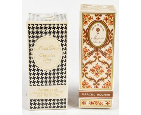 CHRISTIAN DIOR; a vintage Miss Dior unopened and unused 2fl oz eau de toilette atomiser, boxed and sealed and a boxed Marcel 