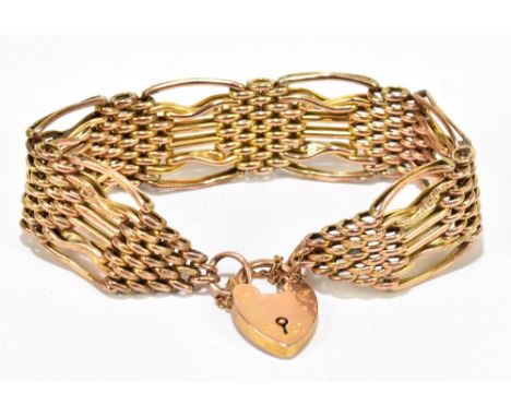A 9ct gold gate link bracelet, with heart shaped lock, weight 27.5g.&nbsp;