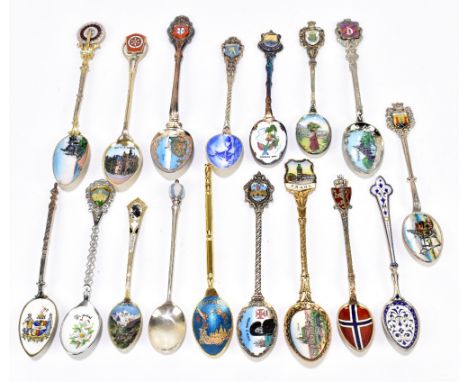 A Continental silver and enamel tea spoon, with white and blue floral detailing, a Norwegian silver and enamel spoon and four