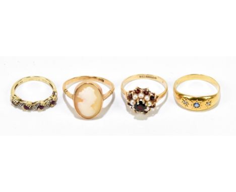 Three 9ct yellow gold rings including a cameo example, sizes S, O 1/2 and J, also a yellow metal Edwardian ring, size O 1/2, 