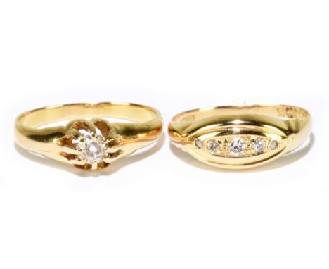 An 18ct yellow gold solitaire ring, size N, and an 18ct yellow gold five stone diamond ring, size K, combined approx. 5.9g.Ad