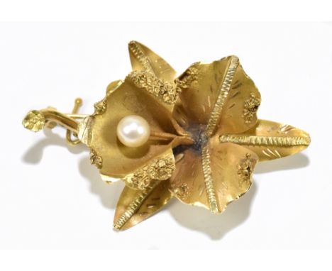 A yellow metal and single cultured pearl lily brooch, 50 x 33mm, the pearl approx 6mm diameter, approx 9.5g.Additional Inform