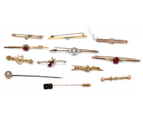 Twelve yellow metal and 9ct gold bar brooches and stick pins, including ruby, aquamarine, diamond, etc, largest 7cm, combined