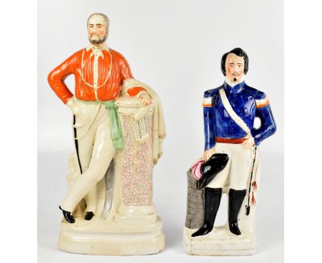 Two large 19th century Staffordshire figures, comprising Garibaldi modelled standing beside a column, height 48cm, and Louis 