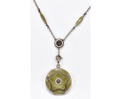 A sterling silver and pale green enamel decorated locket of trace chain with enamelled panels and lower circular disc surmoun