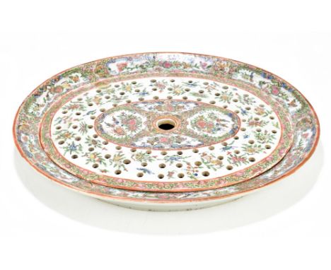 A 19th century Canton Chinese Famille Rose porcelain meat drainer and bowl of oval form, painted with exotic birds and floral