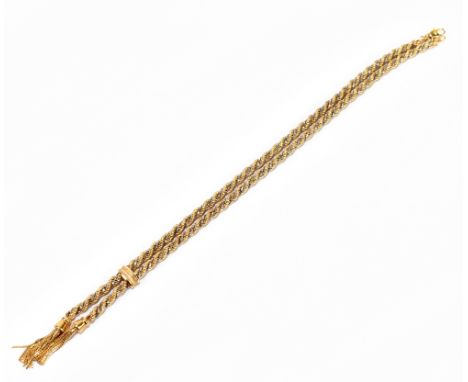 A 9ct yellow gold and white metal fancy link necklace with twin tassel drops, length to bar 42cm, approximately 21g.&nbsp;Add