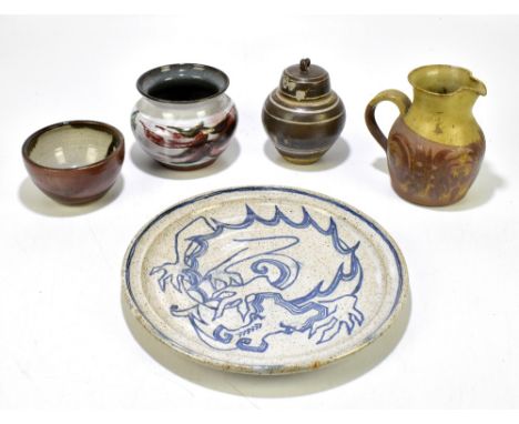 BARBARA WRIGHT; a ceramic plate decorated with a dragon, diameter 30cm, a jar and cover by the same artist with linear decora