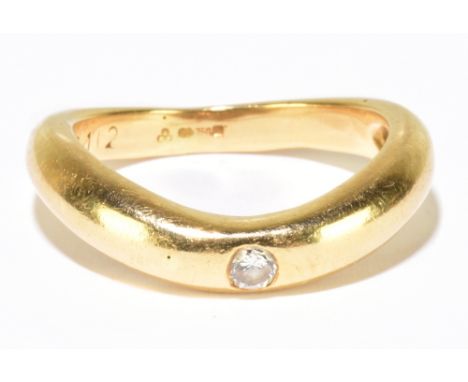 An 18ct yellow gold and diamond wishbone shaped ring, the diamond weighing approx. 0.12cts and collet set in the band, ring s