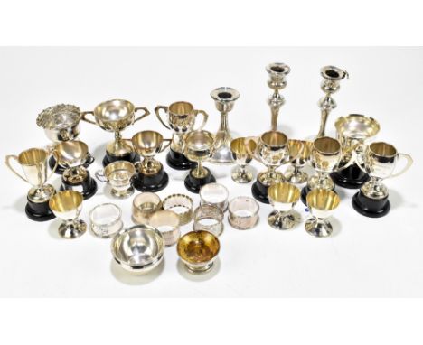 Assorted silver and plate, to include a hallmarked silver dwarf candlestick, Birmingham 1922, two silver candlesticks, height