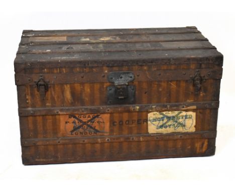 LOUIS VUITTON; a large 19th century travelling cabin trunk with label to interior, no.15450, with brown striped patterned lea