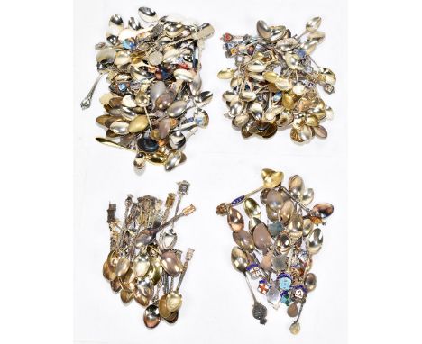 A large collection of English, Continental and other white metal collectors' spoons, mostly with enamel and other city and to