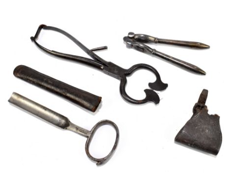 A 19th century steel sugar loaf cutter, together with a nutcracker and horse hoof cleaning tool.