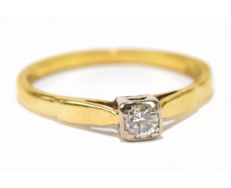 An 18ct yellow gold illusion set solitaire ring set with a princess cut diamond, approximate size P 1/2,&nbsp;approximately 2