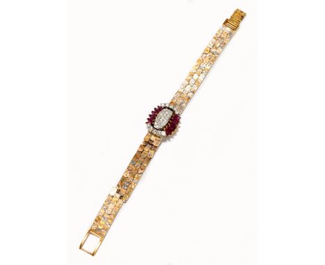 OMEGA; an unusual lady's vintage 18ct gold diamond and ruby cocktail watch, the brick link two tone bracelet centred with a h