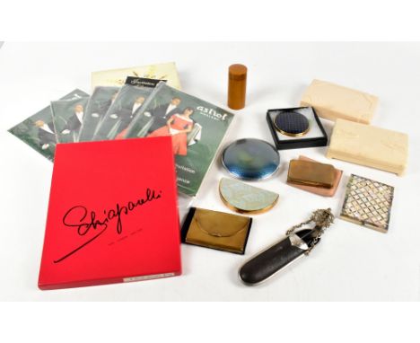 A collection of five vintage powder compacts, including a large enamelled example, two bakelite boxes, a shaving stick, two b