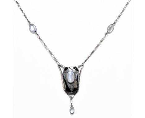 An Art Nouveau style white metal black enamelled and moonstone set necklace, with fetter and curb chain, length of chain 44cm