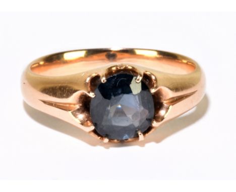 A yellow metal gem set ring, the dark green oval stone in eight claw setting, ring size L 1/2, approx. 4.35g.Additional Infor