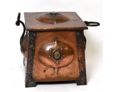 An Arts &amp; Crafts copper and wrought iron twin handled coal box of square form, set with two ceramic cabochons, possibly R