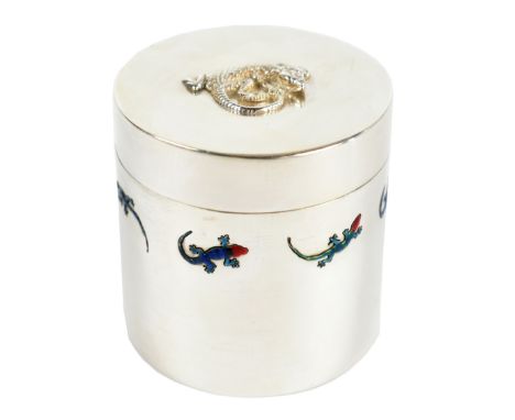 A modern hallmarked silver and enamel cylindrical box and cover, the top mounted with a gecko and the sides decorated with se