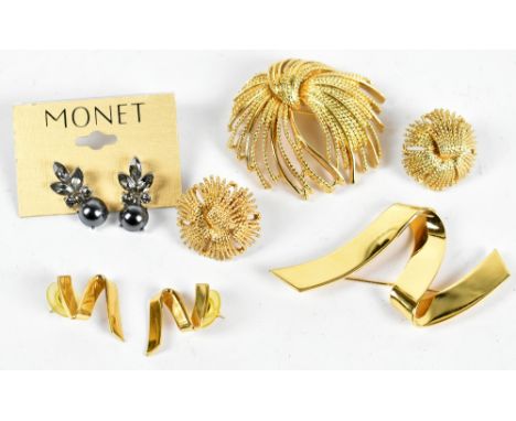 MONET; a vintage 1980s urchin brooch, a set of Cordelia earrings, a gold tone Zig Zag brooch and matching earrings and a pair