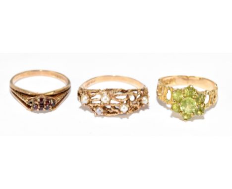 Three 9ct gold dress rings, including peridot cluster, size N, pearl abstract, size R and garnet cluster, size M, combined ap