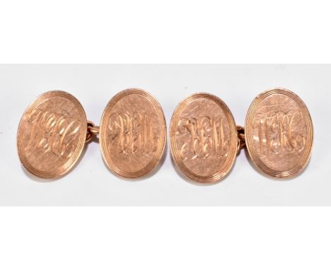 A pair of 9ct rose gold cufflinks with oval platforms engraved with initials WRC, combined approx. 13.5g.&nbsp;Additional Inf