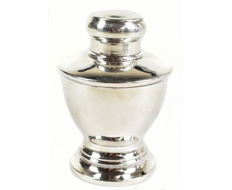 An Edwardian hallmarked silver cylindrical tea caddy and cover, Birmingham 1916, weight 2ozt/68g, height 10cm.&nbsp;Additiona