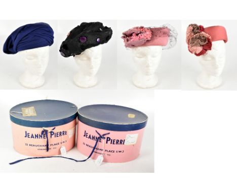 JOHN BOYD; a vintage rose pink pill box hat with silk flowers and tulle netting, a deep pink pill box hat with silver flowers