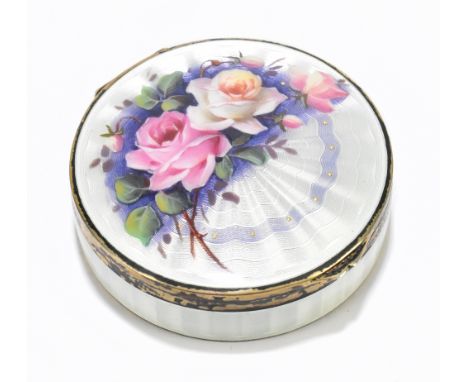 A Continental parcel gilt silver and enamel circular box, the lid decorated with roses, diameter 5.5cm.Additional Information