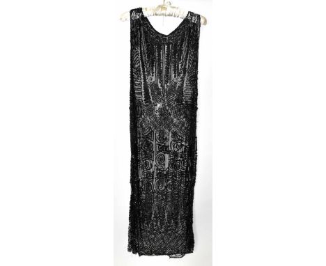 A 1920s black lace handmade tunic dress embellished with black sequins and black and silver beads, with a round neck decorate