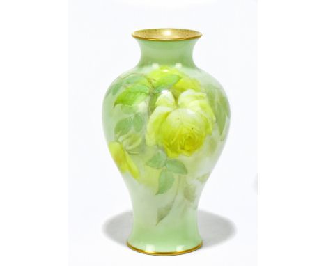 ROYAL WORCESTER; a hand painted vase, shape number 2471, painted with floral sprays on a light green ground, black printed ma