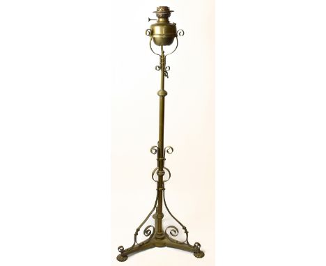 A late 19th century brass adjustable telescopic standard oil lamp.
